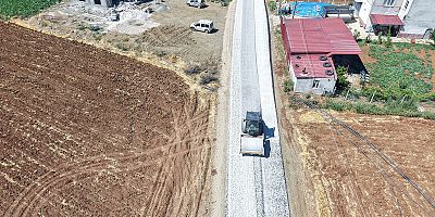 BÜYÜKŞEHİR’DEN EKİNÖZÜ KIRSALINA YOL YATIRIMI