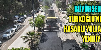 BÜYÜKŞEHİR TÜRKOĞLU’NDA HASARLI YOLLARI YENİLİYOR