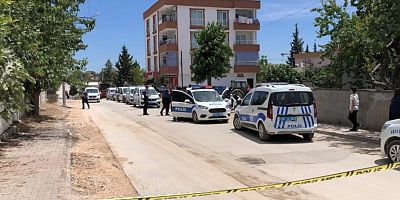 TARTIŞTIĞI KİŞİNİN BOĞAZINI KESTİ