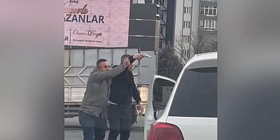 TARTIŞTIĞI KİŞİYE SİLAH ÇEKTİ 