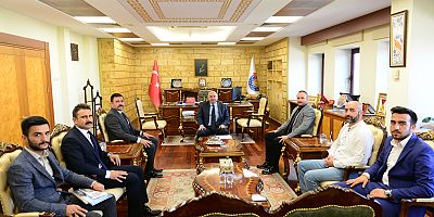 ÜLKÜ OCAKLARINDAN REKTÖR YASIM’A “HAYIRLI OLSUN” ZİYARETİ